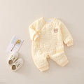 The Quilted Newborn Bodysuit — Buttermilk